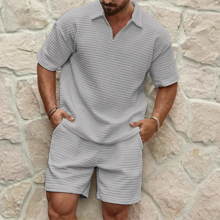 Comfortable men's waffle knit leisure set. This poly-cotton shorts set is perfect for relaxed summer wear.