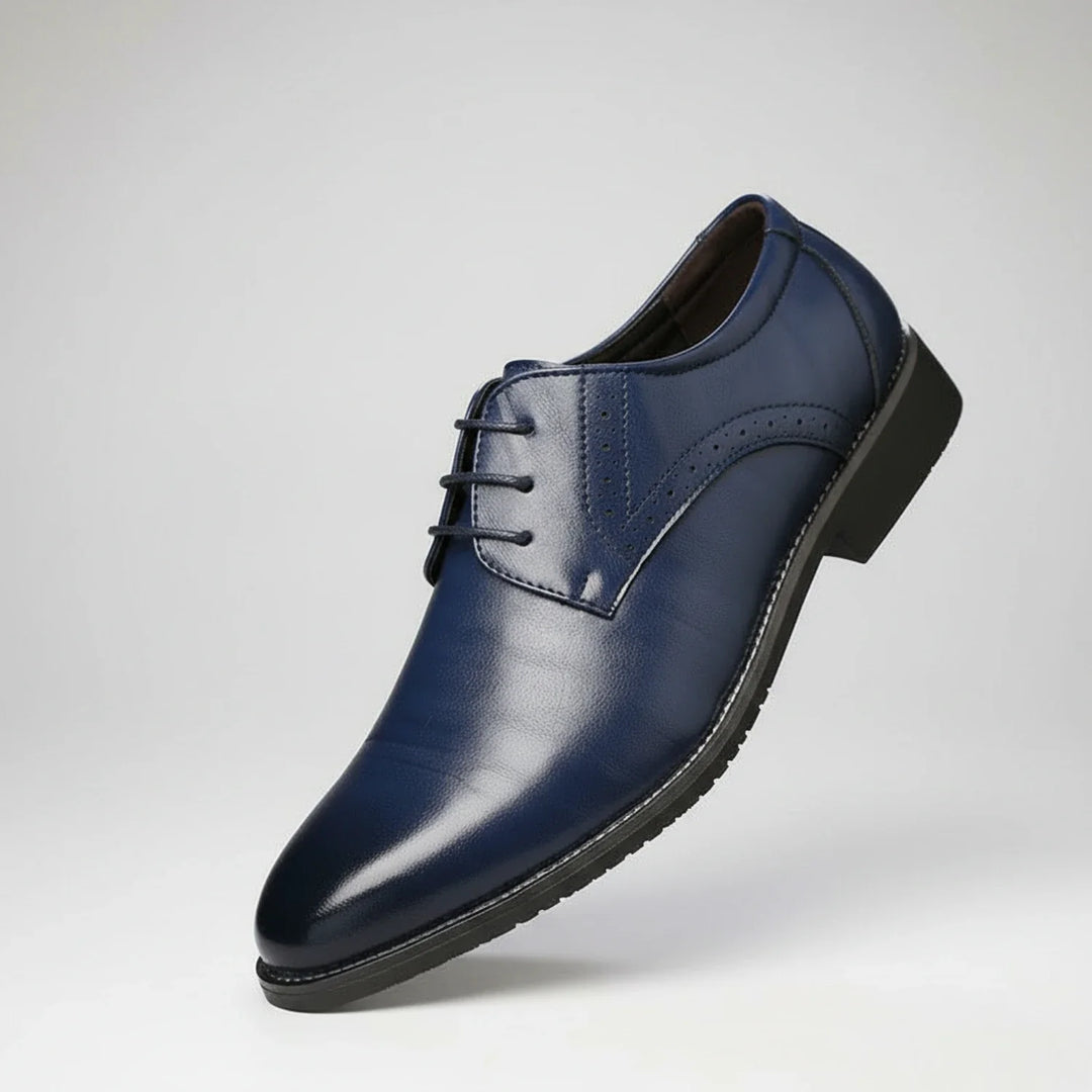 Elegant men's wingtip lace-up dress shoes. Pointed toe, orthopedic support for professional office wear & comfort.