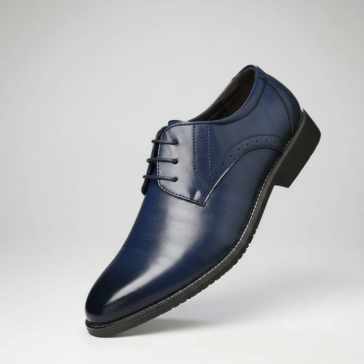 Elegant men's wingtip lace-up dress shoes. Pointed toe, orthopedic support for professional office wear & comfort.