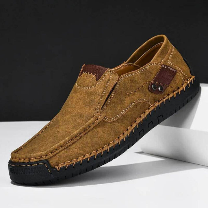 Comfortable men's slip-on orthopedic shoes, featuring arch support & easy wear for casual daily activities.