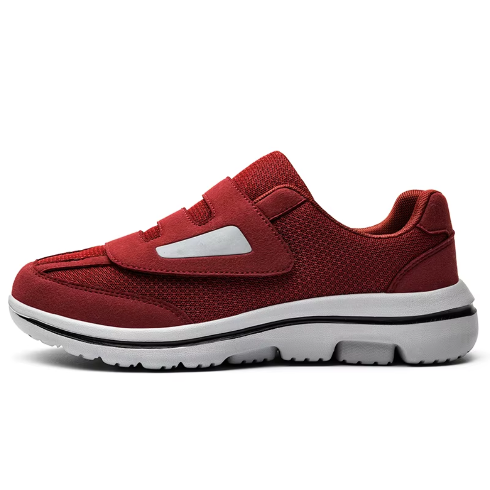 Angled view of men's slip-on orthopedic shoes, wide comfortable fit for easy daily wear.