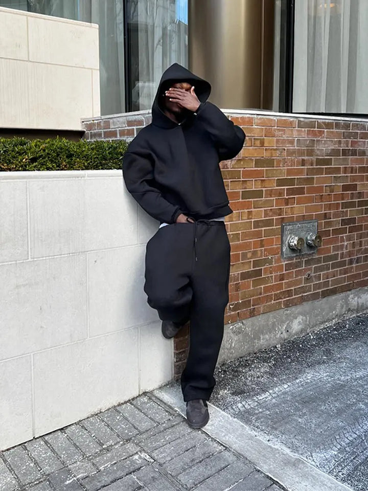 Comfortable men's oversized joggers, component of a 2-piece tracksuit set. Great for loungewear & athletic wear.