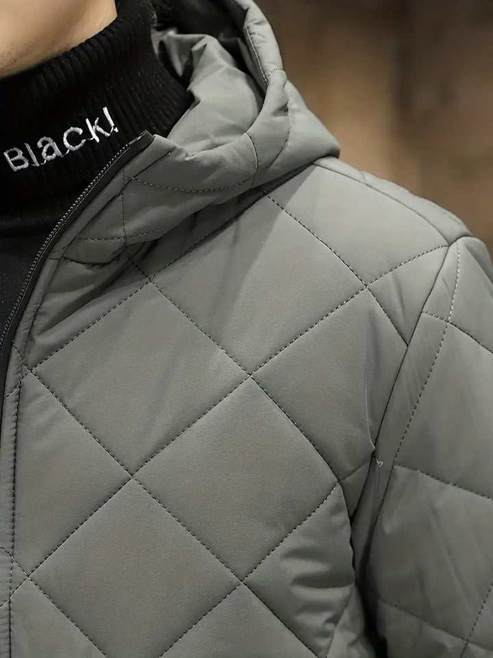 Men's Winter Coat, padded for warmth and windproof for outdoor activities.