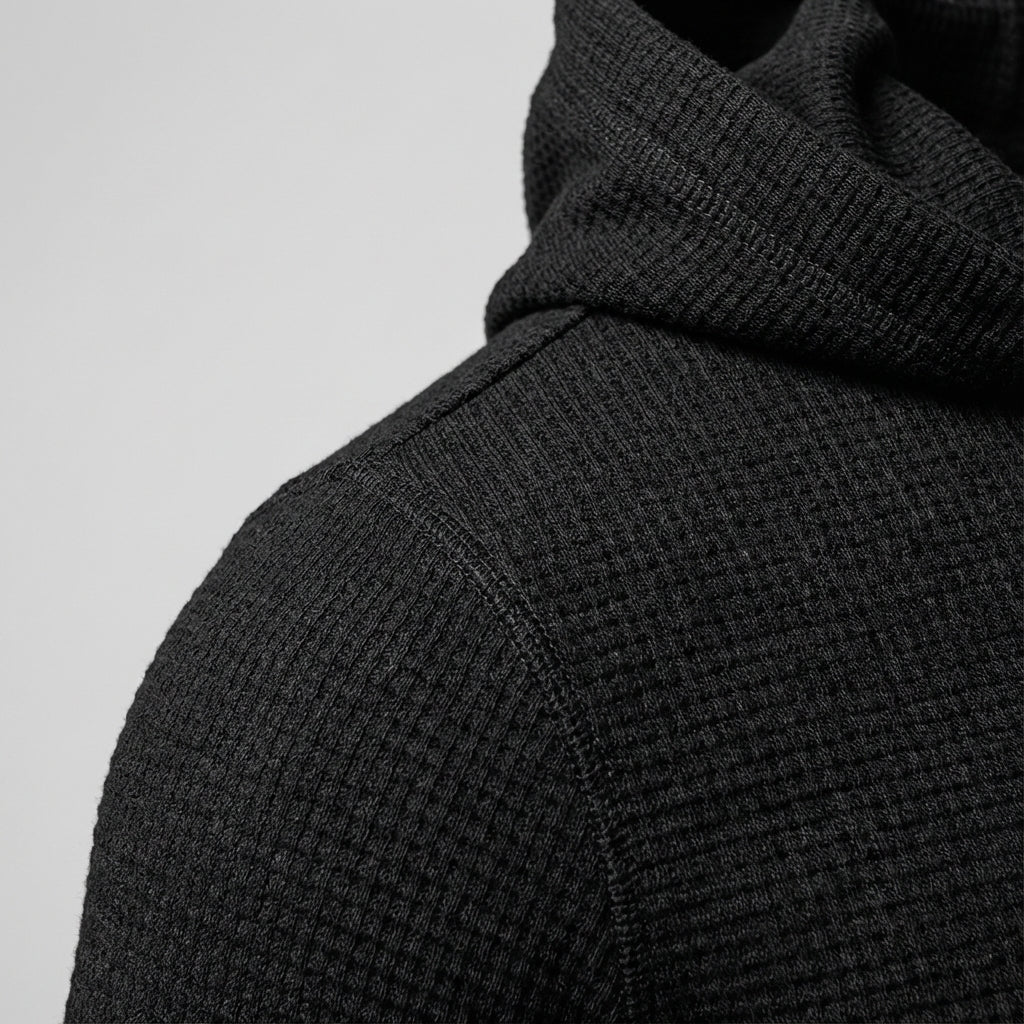 Stylish men's black zipper training hoodie. Slim fit activewear for gym workouts & sportswear. Modern design.
