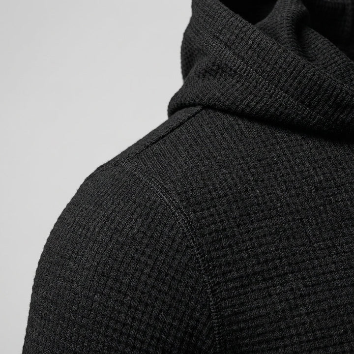 Stylish men's black zipper training hoodie. Slim fit activewear for gym workouts & sportswear. Modern design.