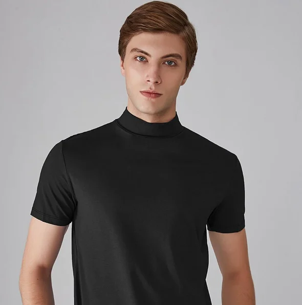 Moisture-wicking men's performance turtleneck. Stay dry, agile long sleeve activewear top for intense training.