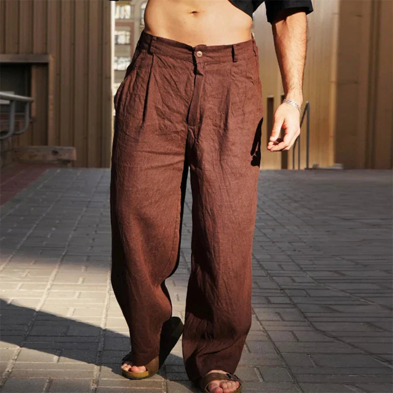 Men's pleated wide leg chino pants in a comfortable loose fit, ideal for casual style and modern menswear.