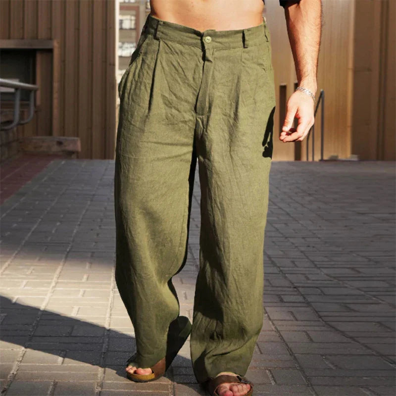 Stylish men's casual outfit featuring comfortable wide leg pleated chino pants, perfect for modern menswear.