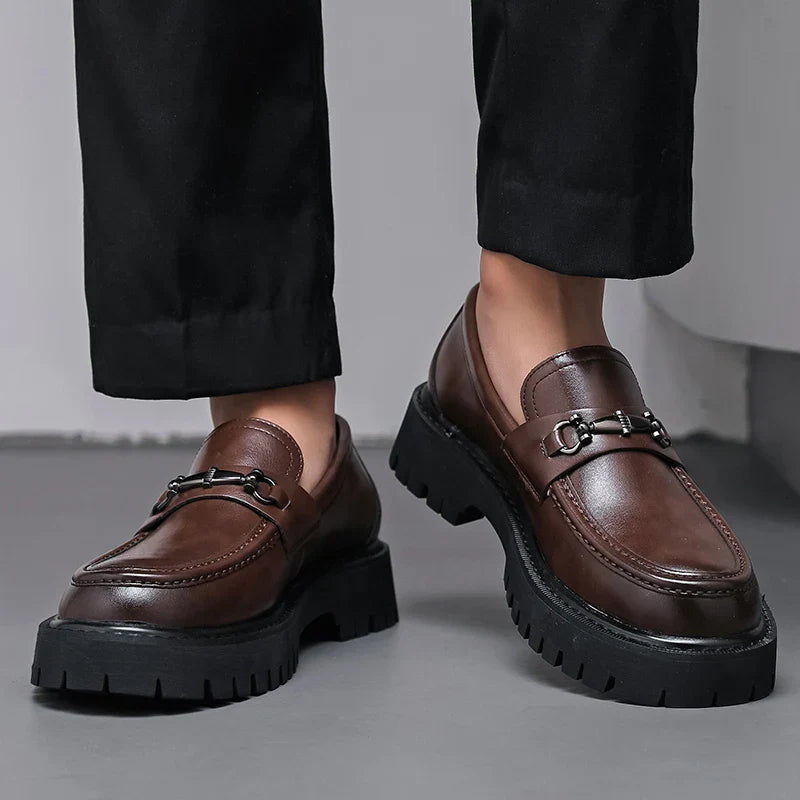 Stylish men's professional footwear, slip-on polished loafers designed for comfort and elegance.