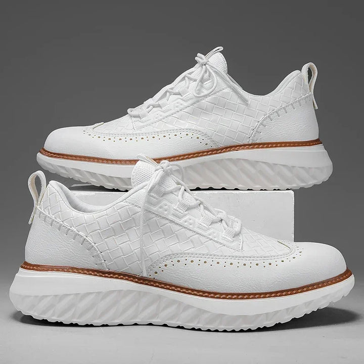 Pair of men's leather casual sneakers, designed for both athletic performance and casual fashion.