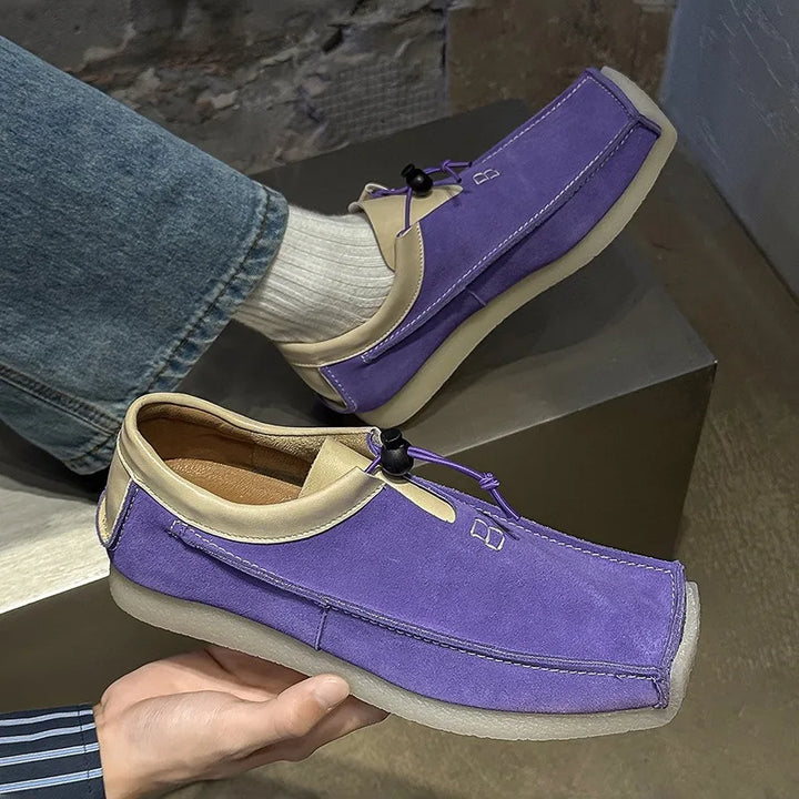 Men's fashion-forward loafers, expertly combining premium leather and soft suede