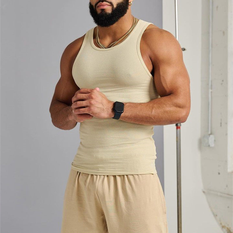 Men's premium green sleeveless tank top, breathable cotton blend for sport or summer fashion.