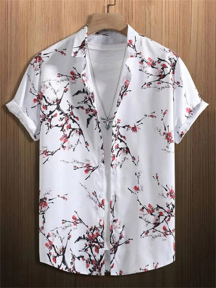 Casual men's short sleeve button-down with vibrant print, ideal for summer.