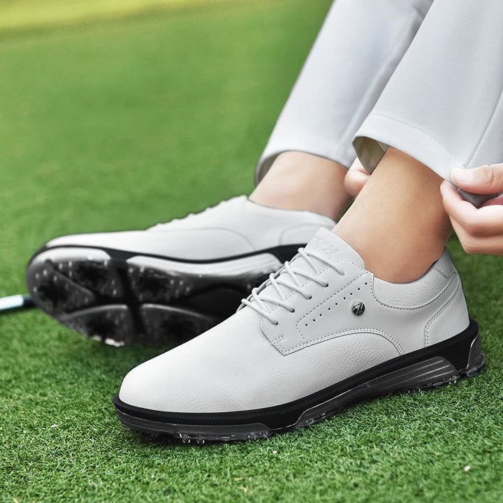 Comfortable Men's athletic golf shoes, providing stable grip & waterproof protection for all-day play.