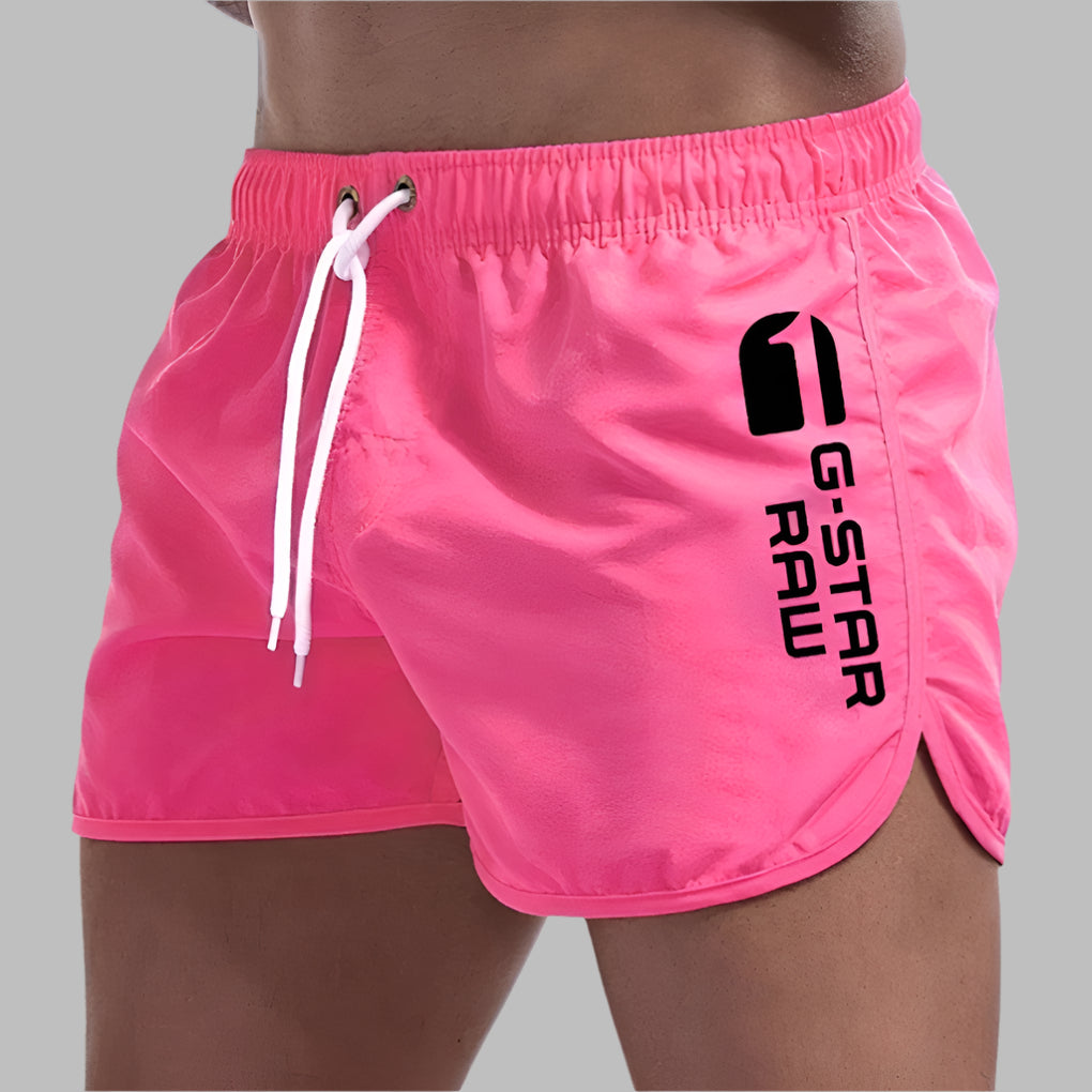 Men's quick-dry swim trunks. Athletic beachwear & pool shorts. Fast-drying swimwear for summer water sports & leisure.