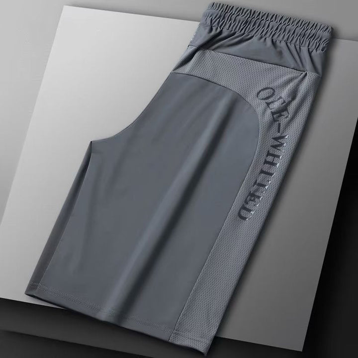 Men's sportswear shorts in a grey shade, offering a versatile option for active and casual outfits.