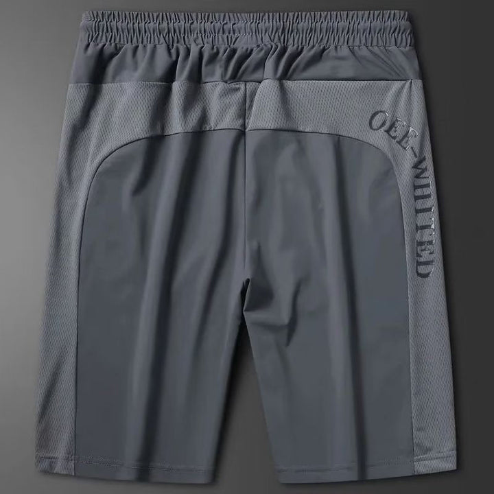 Front view of men's athletic shorts with quick-dry fabric, ideal for running and sportswear.