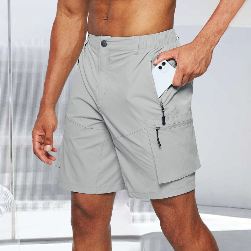 Olive green men's cargo shorts for hiking, showing breathable, active wear design.