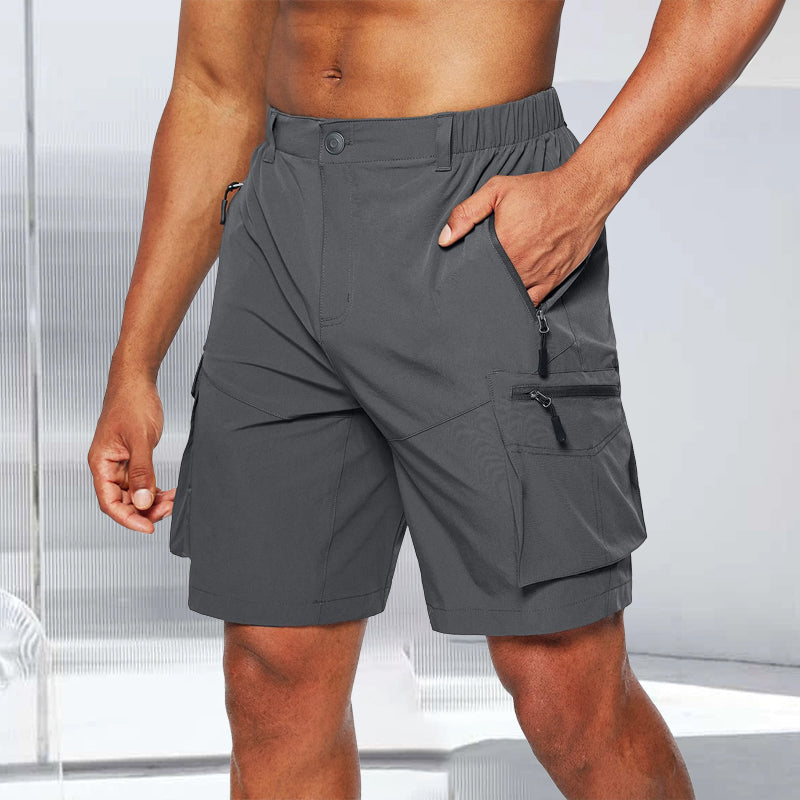 Stack of colorful men's quick-dry cargo shorts for various outdoor adventures.