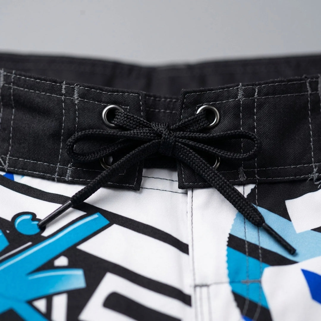 Athletic men's quick-dry printed swim trunks, great for swimming, beach sports & summer activities.