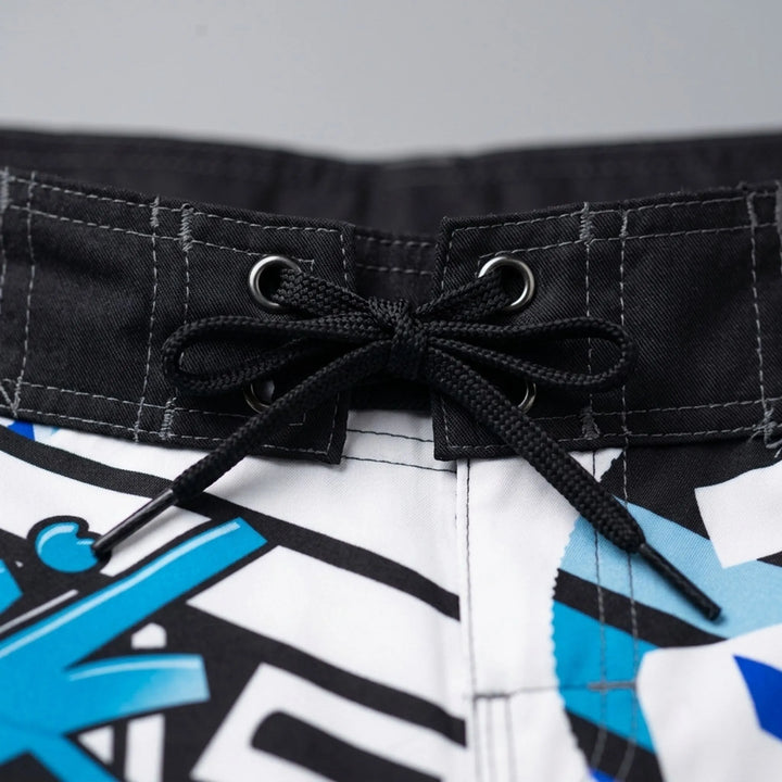 Athletic men's quick-dry printed swim trunks, great for swimming, beach sports & summer activities.