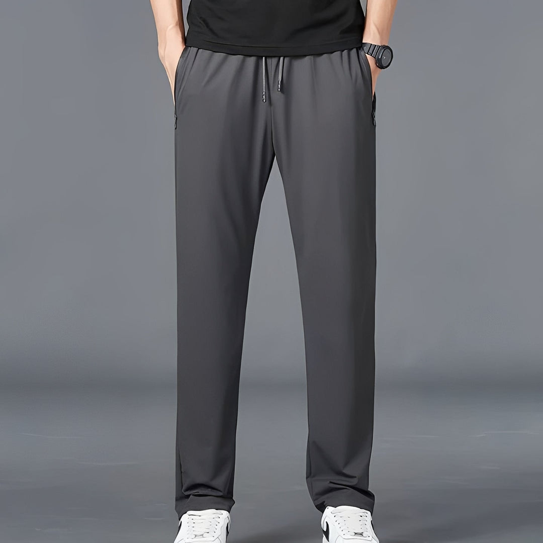 Men's quick-dry stretch hiking pants with cargo pockets, ideal for outdoor trails & travel.