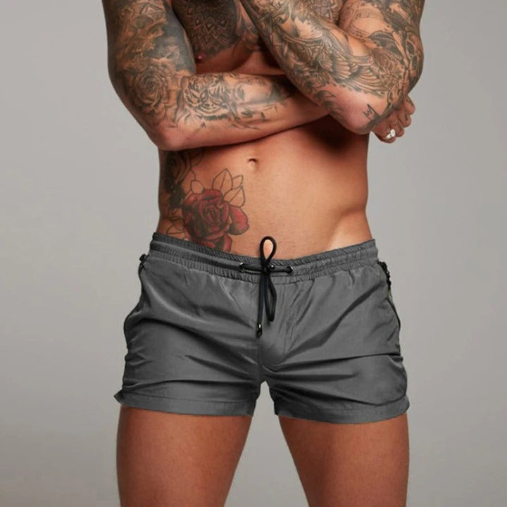 Men's quick-dry stretch swim trunks for beach, pool & active summer comfort.