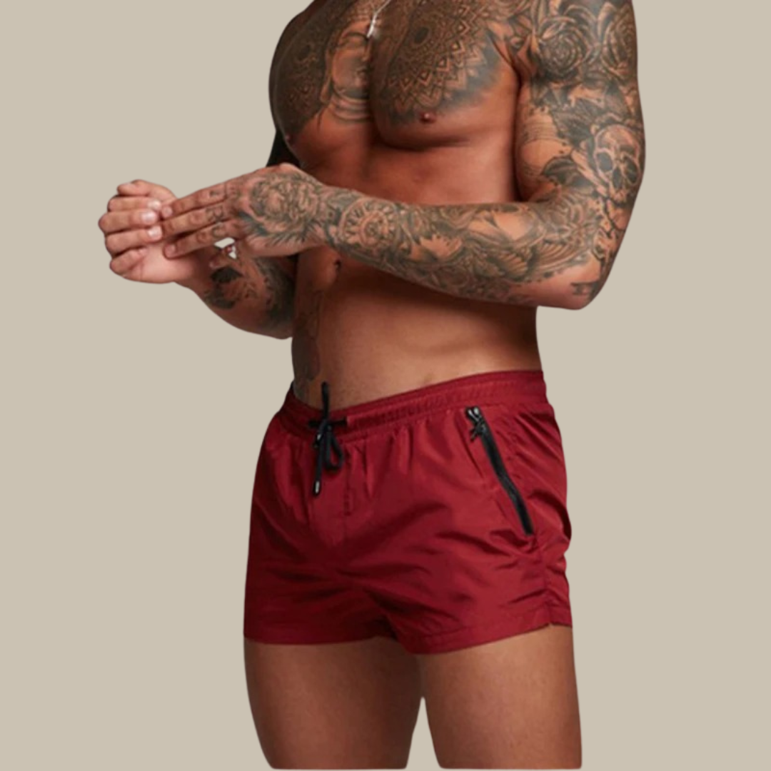 Durable men's stretch quick-dry swim trunks for active water sports & all-day comfort.