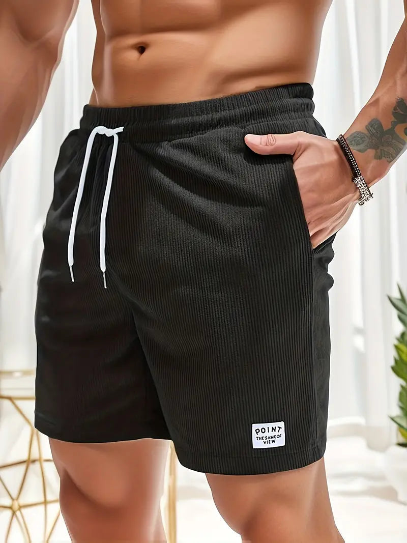 Stylish multi-color men's quick-dry swim shorts. Practical for beachwear and pool activities.