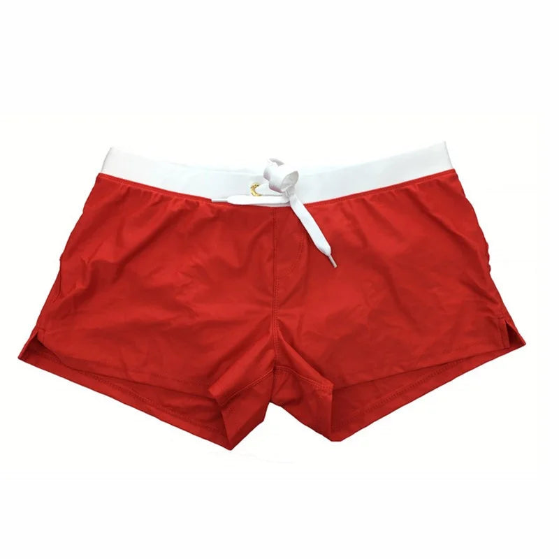 Men's summer swim shorts with quick-dry technology, perfect for the beach, swimming, or casual wear.