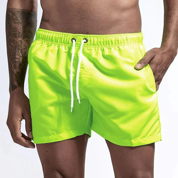 Essential men's quick-dry swim shorts, a must-have for beach, pool, and warm weather activities.