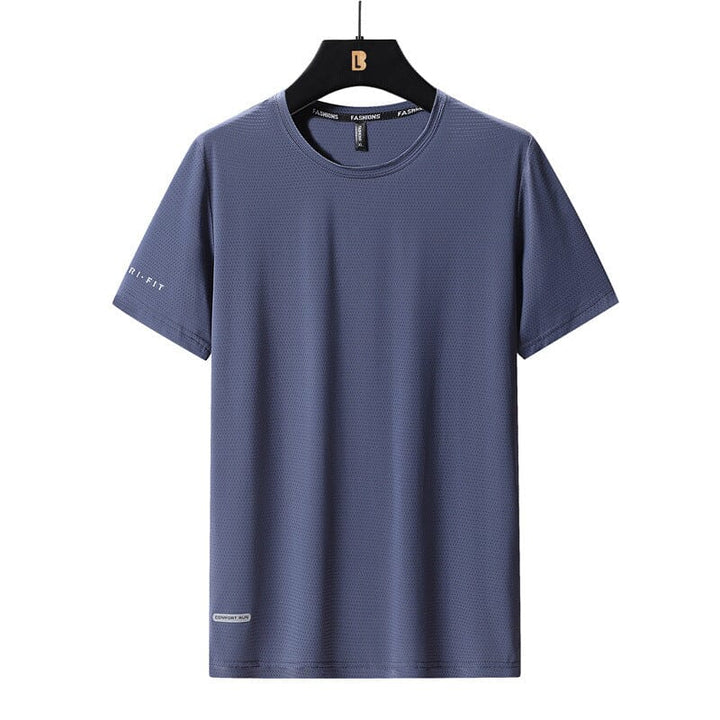 Man wearing a black quick-drying ice silk t-shirt, short sleeve, casual wear, outdoor setting