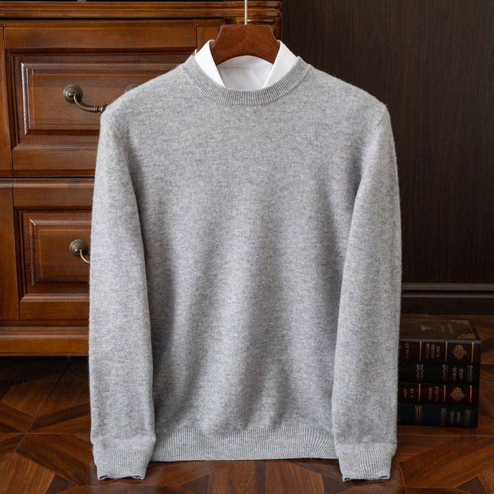 Refined men's Redmond knit sweater, a classic long-sleeve pullover for sophisticated winter fashion.