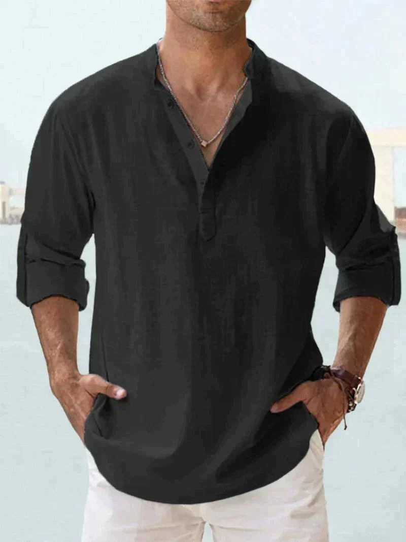 Man wearing a regular fit casual long sleeve button-up shirt, enjoying summer fashion.