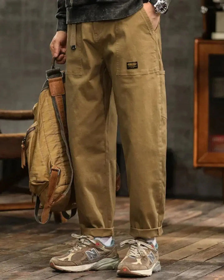 Durable men's utility cargo pants, relaxed fit, featuring ample pockets for practical everyday use.