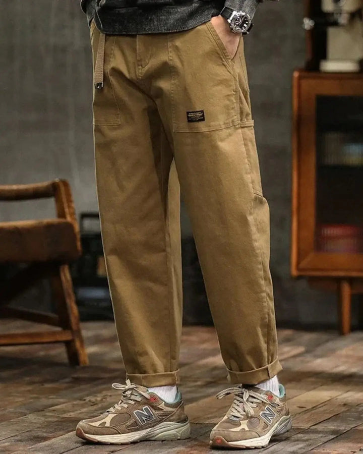 Versatile men's relaxed fit cargo pants with multi-pockets, ideal for outdoor adventures or daily casual wear.