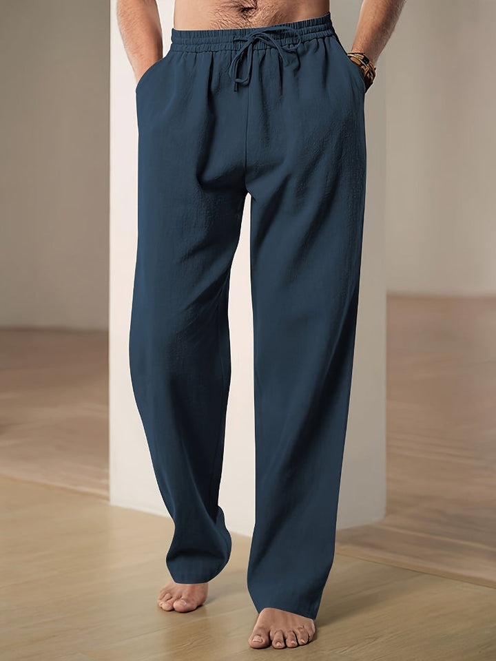Comfortable men's drawstring travel pants, relaxed fit for lounging or on-the-go.