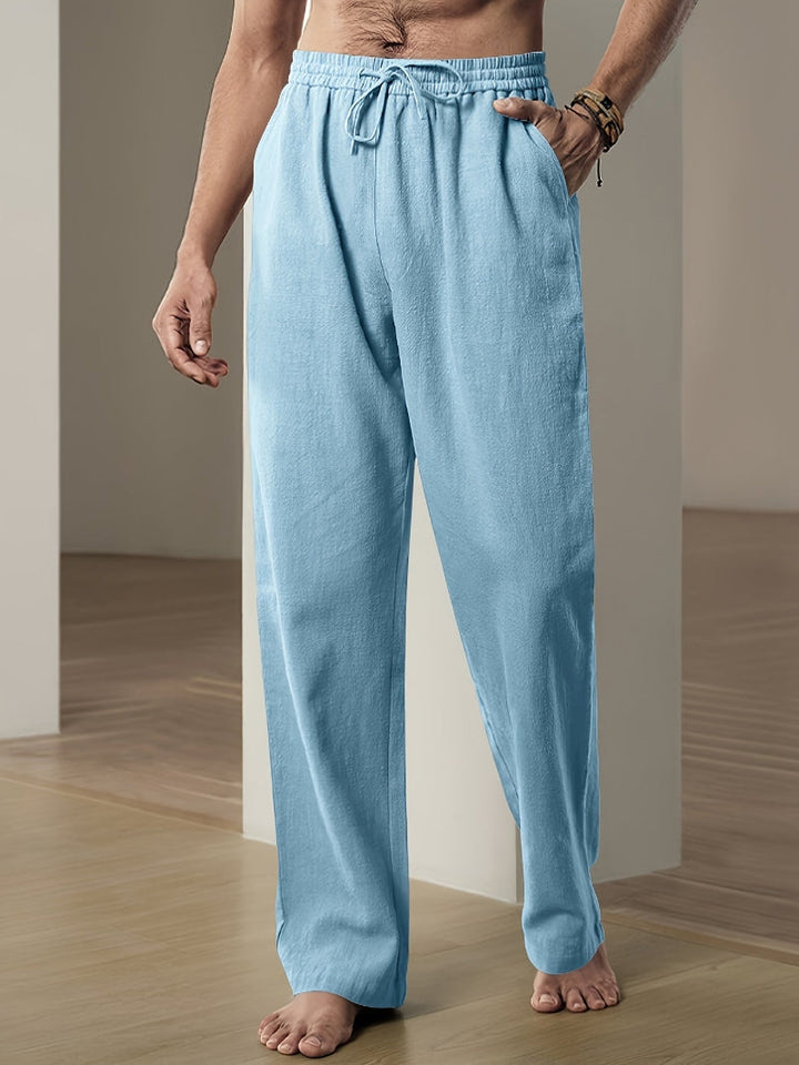 Men's casual drawstring pants, relaxed fit offering supreme comfort and adaptable everyday style.