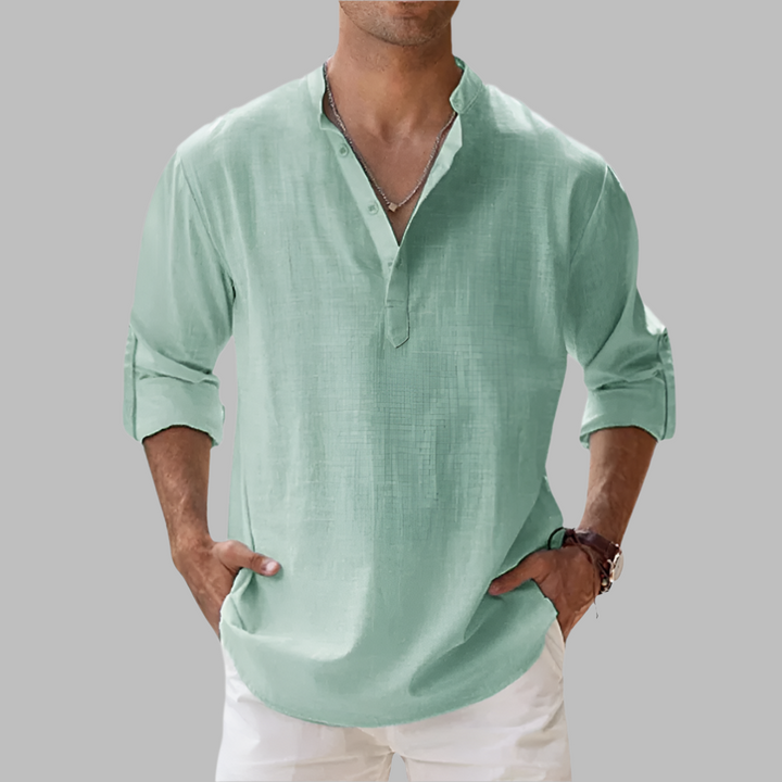 Enjoy warm weather in this men's relaxed fit long-sleeve button-down shirt, lightweight and stylish.