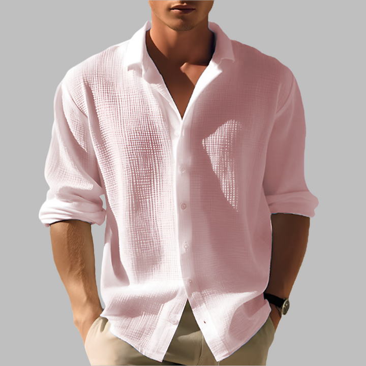 Easy care men's long sleeve casual shirt. Relaxed fit, stand collar, and button-up closure. Comfortable for daily wear.