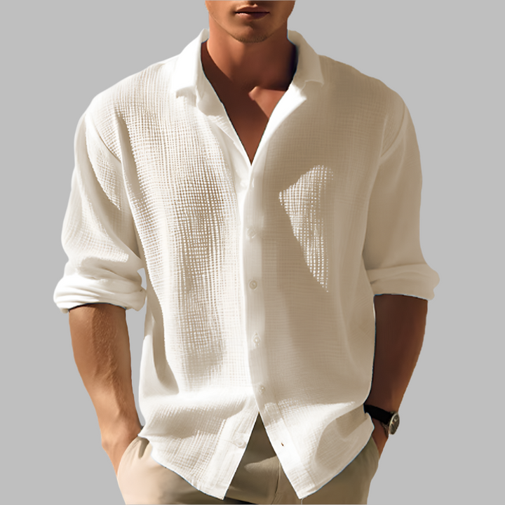 Relaxed fit men's long sleeve button-up shirt with stand collar. Perfect casual wear for vacation, beach, or everyday.