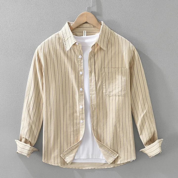 Men's relaxed fit striped button-up shirt in blue and white, perfect for casual everyday wear. Long sleeve collared top.