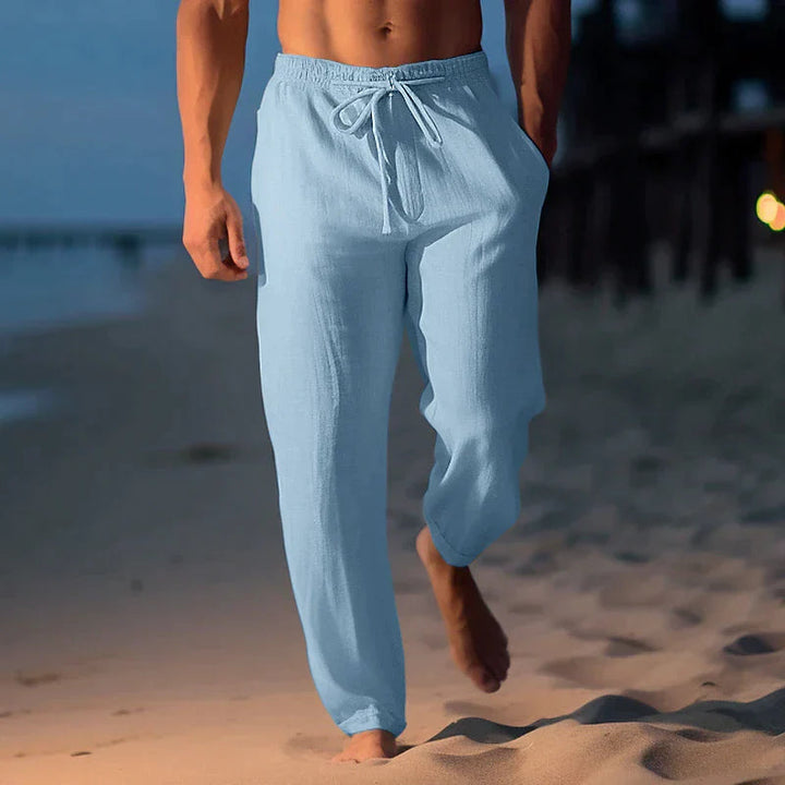 Breathable men's drawstring pants, perfect relaxed fit for summer beach days or comfortable travel.