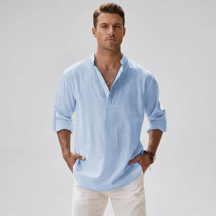 Men's relaxed fit summer shirt. Breathable, stylish, and lightweight button-down for casual wear.