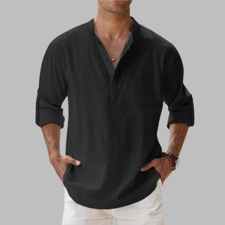 Stylish men's relaxed fit button-down shirt. Hip-length design, ideal for casual summer and spring wear.
