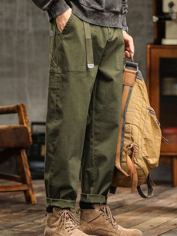Stylish men's utility pants with a comfortable relaxed fit, featuring multiple pockets for practical everyday use.