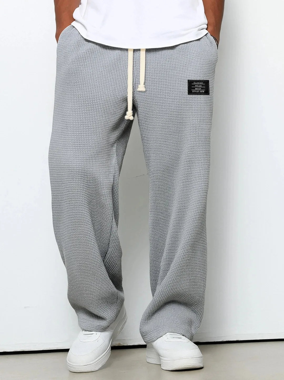 Stylish men's casual relaxed fit waffle knit lounge pants, ideal for comfortable leisure and everyday wear.