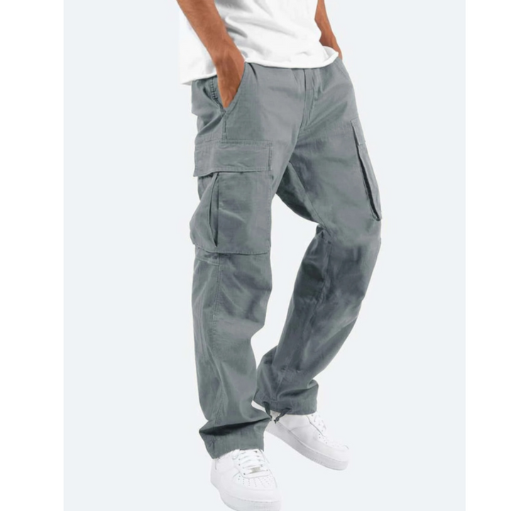 Men's relaxed fit wide leg cargo pants, practical multi-pockets, combining comfort with modern streetwear style.