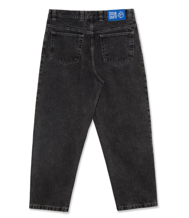 Close-up of the durable denim fabric on men's wide-leg pants, ideal for casual and streetwear looks.