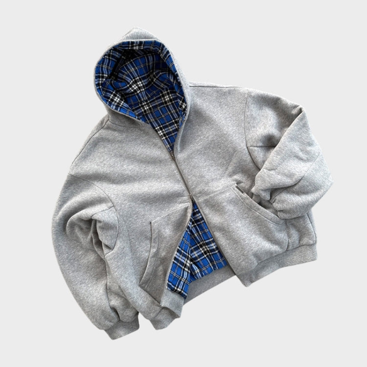 Relaxed fit men's reversible hooded sweatshirt, offering versatile oversized streetwear looks.